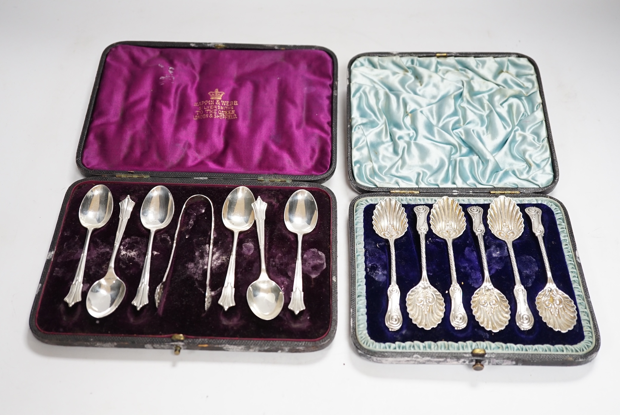 A cased set of six late Victorian silver teaspoons, Mappin & Webb, Sheffield, 1893 and one other later similar cased set with sugar tongs.